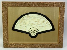 A CHINESE CARVED HARDSTONE FAN SHAPE PLAQUE, carved with birds on a tree branch, framed and