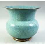 A CHINESE JUN STYLE POTTERY PLANT BOWL, with pierced base, 19cm high.