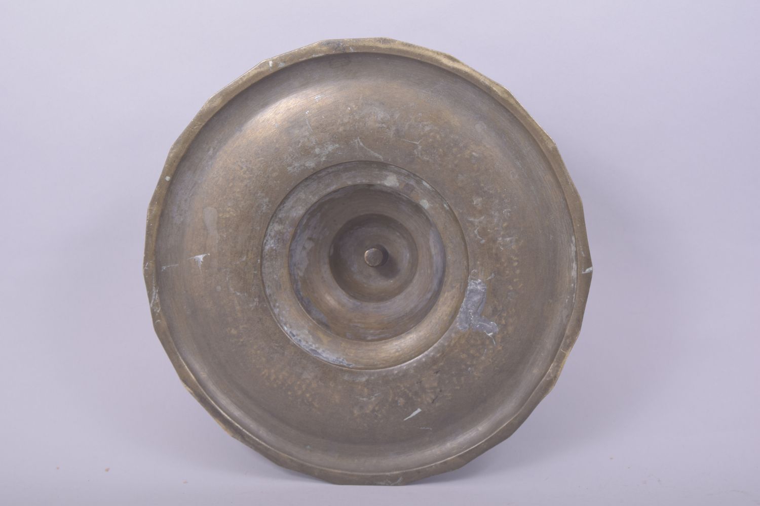 AN ISLAMIC ENGARVED CALLIGRAPHIC BRASS CIRCULAR BASE, 26cm diameter. - Image 2 of 2