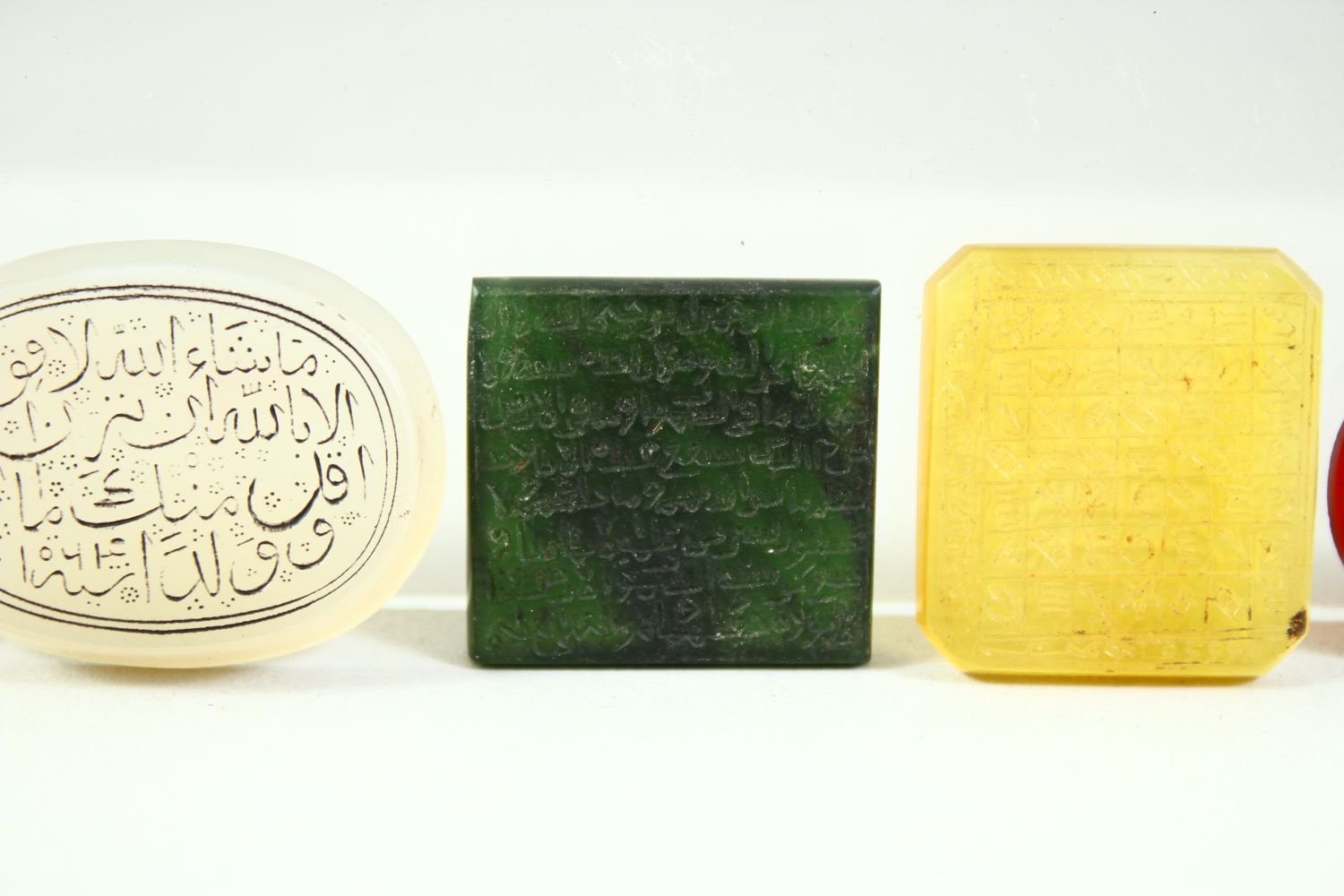 EIGHT SMALL ISLAMIC ENGRAVED CALLIGRAPHIC SEALS, of various stones (8). - Image 4 of 9