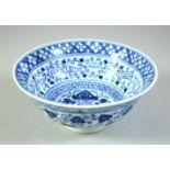 A CHINESE BLUE AND WHITE PORCELAIN BOWL, the interior with lotus, further decorated with bands of