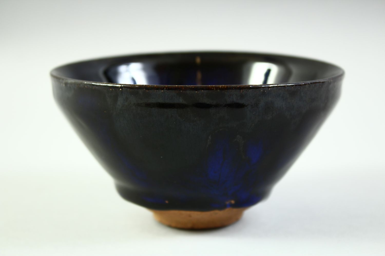 A CHINESE DARK BLUE GLAZE POTTERY BOWL, with carved mark to base, 12cm diameter. - Image 5 of 8