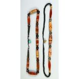 TWO DZI BEAD NECKLACES.