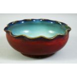 A CHINESE PETAL SHAPE JUN WARE BOWL, 19.5cm diameter.