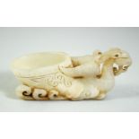 A GOOD CHINESE WHITE JADE PHOENIX LIBATION BOWL, of archaic form and design, 3.5in long & 1.5in