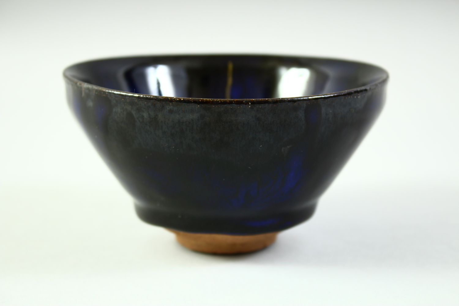 A CHINESE DARK BLUE GLAZE POTTERY BOWL, with carved mark to base, 12cm diameter. - Image 4 of 8