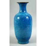 A GOOD CHINESE FLAMBE BLUE GLAZED POTTERY VASE, the base with incised six character mark, 35.5cm