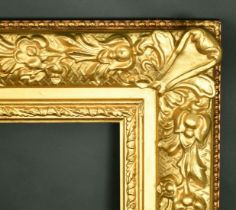 A 20th Century gilt composition frame, rebate size 30" x 40" (76cm x 101.5cm).