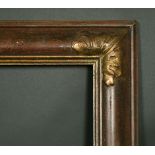 A 20th Century gilt composition frame, rebate size 33.5" x 30", (86cm x 76cm).