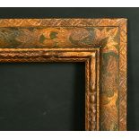 A Spanish incised frame, rebate size 18" x 22", (46 x 56 cm).
