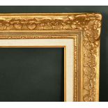 A 20th Century gilt composition frame, rebate size 19.75" x 25.5", (50 x 65cm).