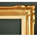A 20th Century carved American frame, 22" x 32".