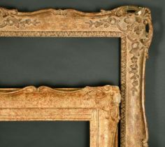 An early 20th Century swept frame, rebate size 36" x 60", along with a similar frame, 30" x 50",