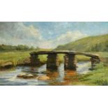 S. Lawton (20th Century) A stone bridge over a stream, oil on canvas, signed, 12" x 20".