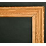 A carved pine frame, rebate size 26.5" x 33.5", (67 x 85cm).