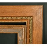 A moulded Oak frame with burr wood inset, 12" x 30" along with an Oak frame with gilded