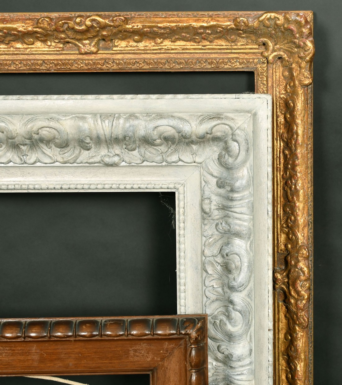 An early 20th Century silvered composition frame, rebate size 142 x 18", (35 x 46cm, along with a