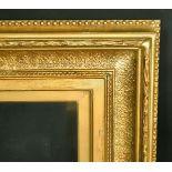 A 19th Century gilt composition frame, rebate size 12" x 20".