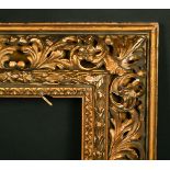 A 19th Century Continental frame with carved foliate scrolling decoration, rebate size 6.75" x 10.5"