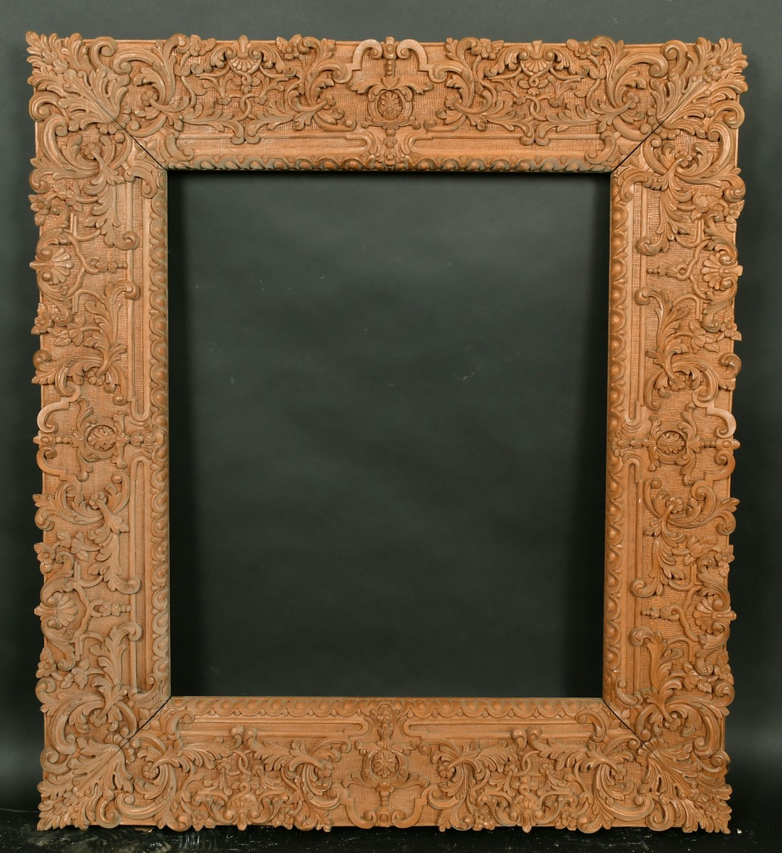 A highly carved 20th Century frame, rebate size 20" x 24". - Image 2 of 2