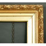 A 19th Century gilt composition frame, rebate size 20" x 30".