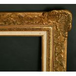 A 20th Century gilt composition frame, rebate size 27.25" x 32.25", (69cm x 82cm).