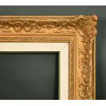 An early 20th Century gilt composition frame, 21.25" x 25.5", (54 x 65cm)