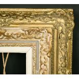 A 20th Century gilt composition frame, rebate size 12.5" x 16" (32cm x 40cm), along with a further