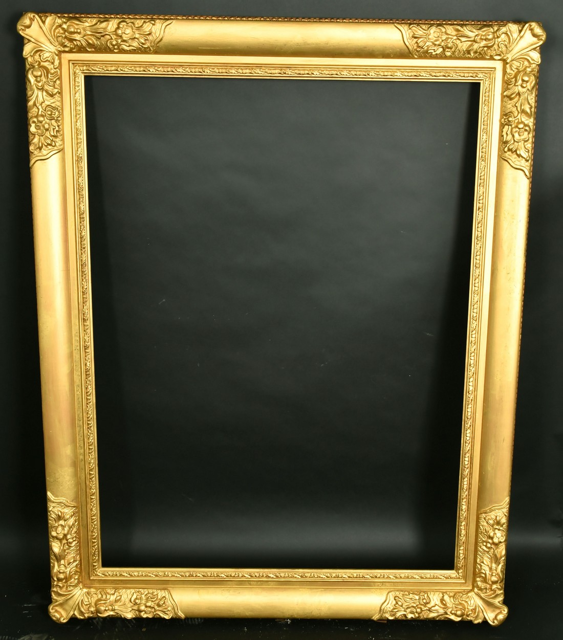 A 20th Century gilt composition frame, rebate size 30" x 40" (76cm x 101.5cm). - Image 2 of 2