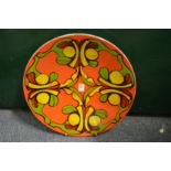 A good large Poole Pottery Delphis charger, orange ground with stylized decoration, shape no. 54,