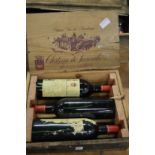 A cased set of three bottles of Chateau Parenchere 1982.