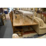 A good large pine six plank refectory style dining table (reputedly used for folding parachutes).