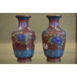 A pair of cloisonne vases.