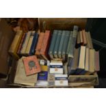 A box of books, cigarette cards.