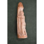 An erotic ivory carving.