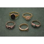 Five various gold rings.