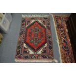 A small Persian style rug.
