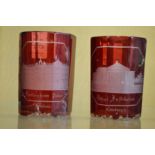 A pair of ruby tinted cut glass Spa beakers.