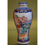 A Famille Rose baluster shaped vase.