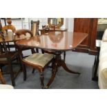 A good 19th century mahogany rounded rectangular tilt-top breakfast table.