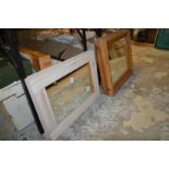 Two pairs of pine framed mirrors.