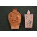 Two Chinese ivory snuff bottles.