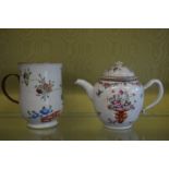 A Famille Rose teapot and cover and a Famille Rose tankard.