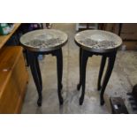 A pair of decorative tables.