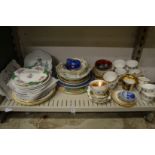 A shelf of decorative china.