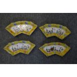 A set of four Canton enamel fan shaped dishes.