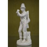 A white porcelain figure of a huntsmen.