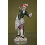 A small Derby figure of a servant girl.