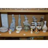 A shelf of decorative china.