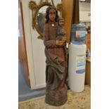 A large carved wood Madonna and Child, 5ft 3ins tall.